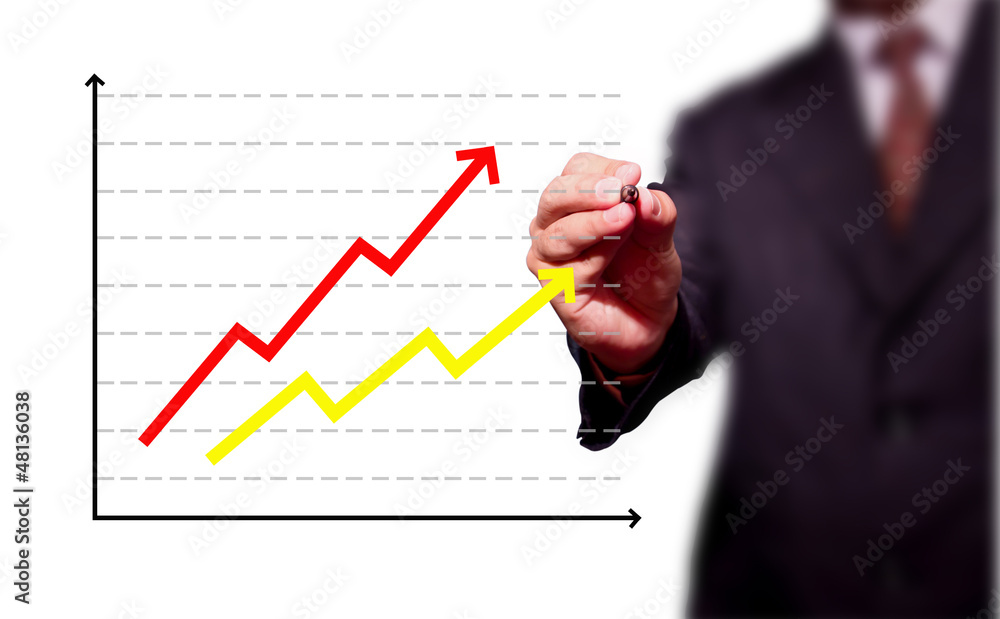 business man drawing over target achievement graph business man drawing over target achievement graph