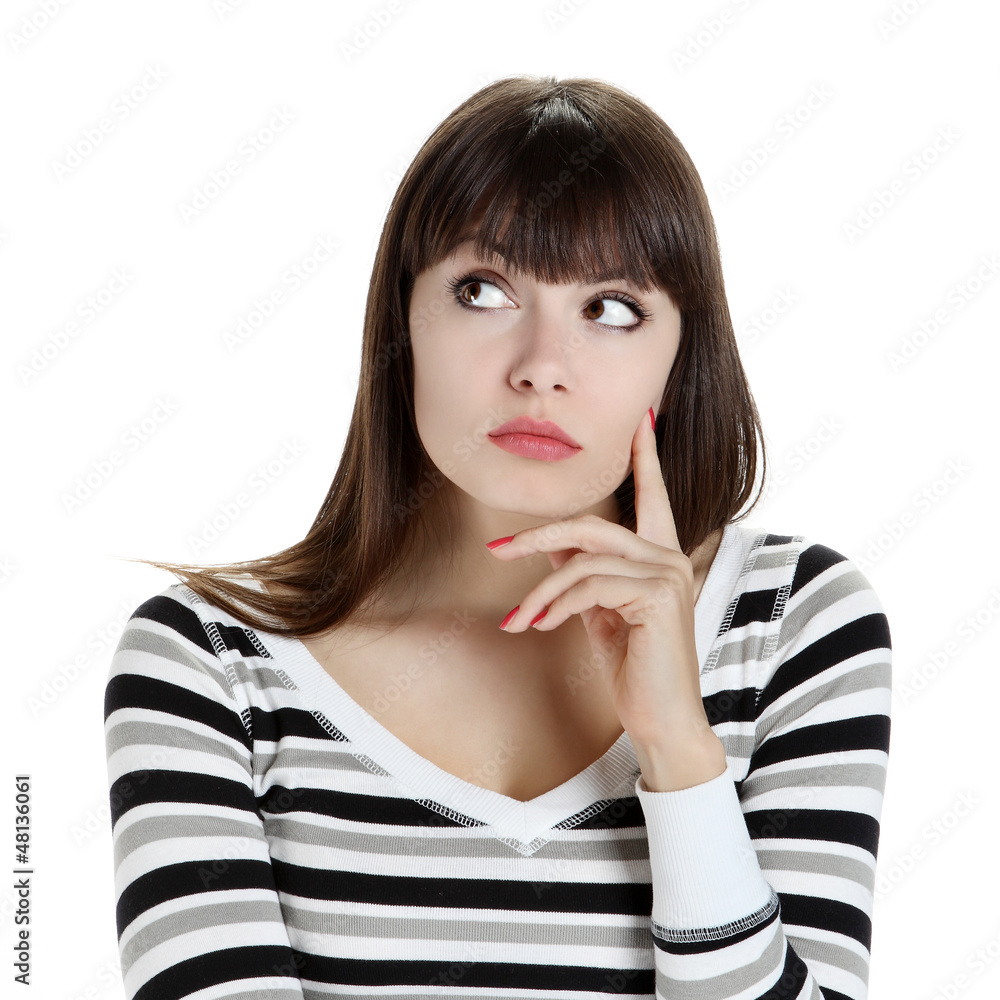 smiling girl looks up with eyes indicating