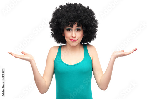 Woman with afro expressing confusion