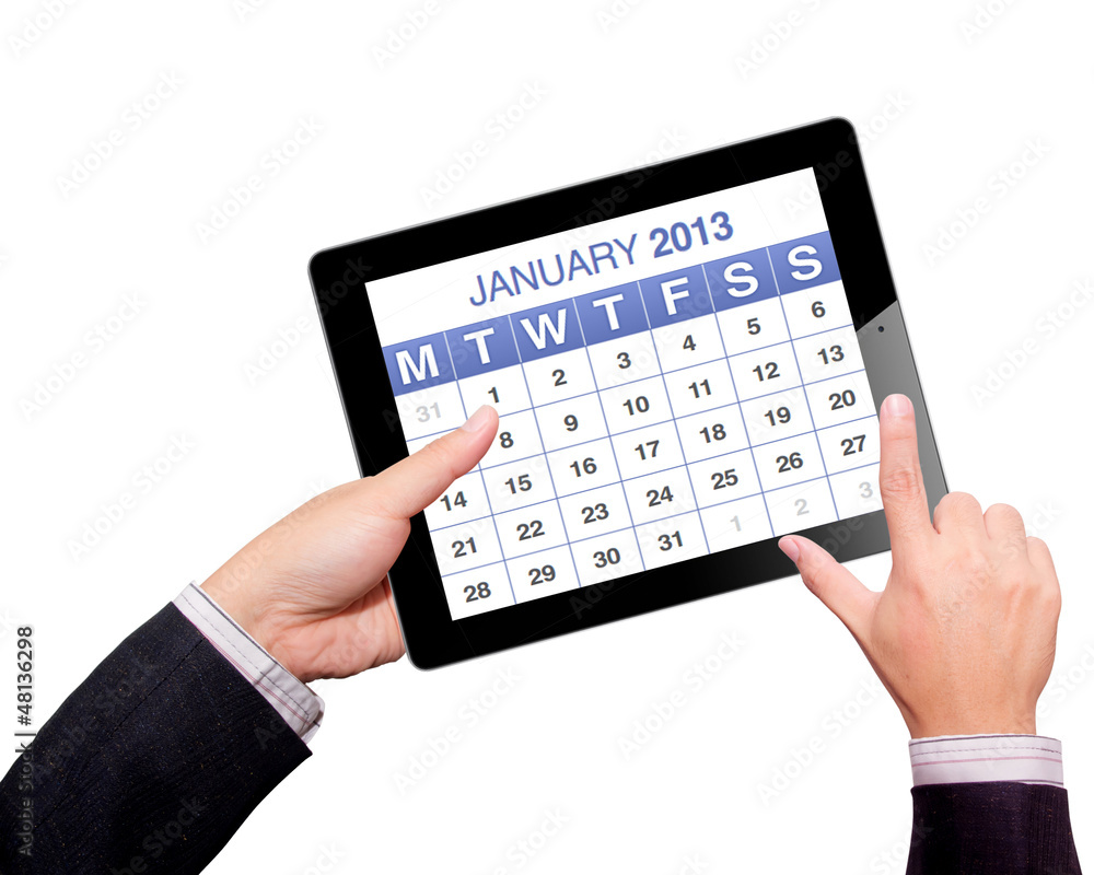 Hands with tablet computer calendar 2013. Isolated on white back Hands with tablet computer calendar 2013. Isolated on white back