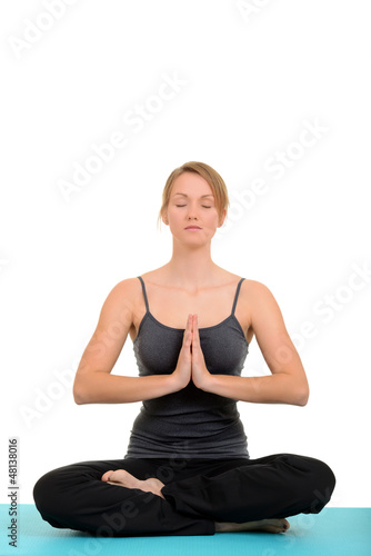 Young blond woman doing yoga