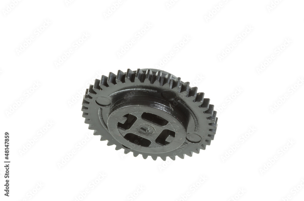 Plastic toothed gear isolated on white Plastic toothed gear isolated on white