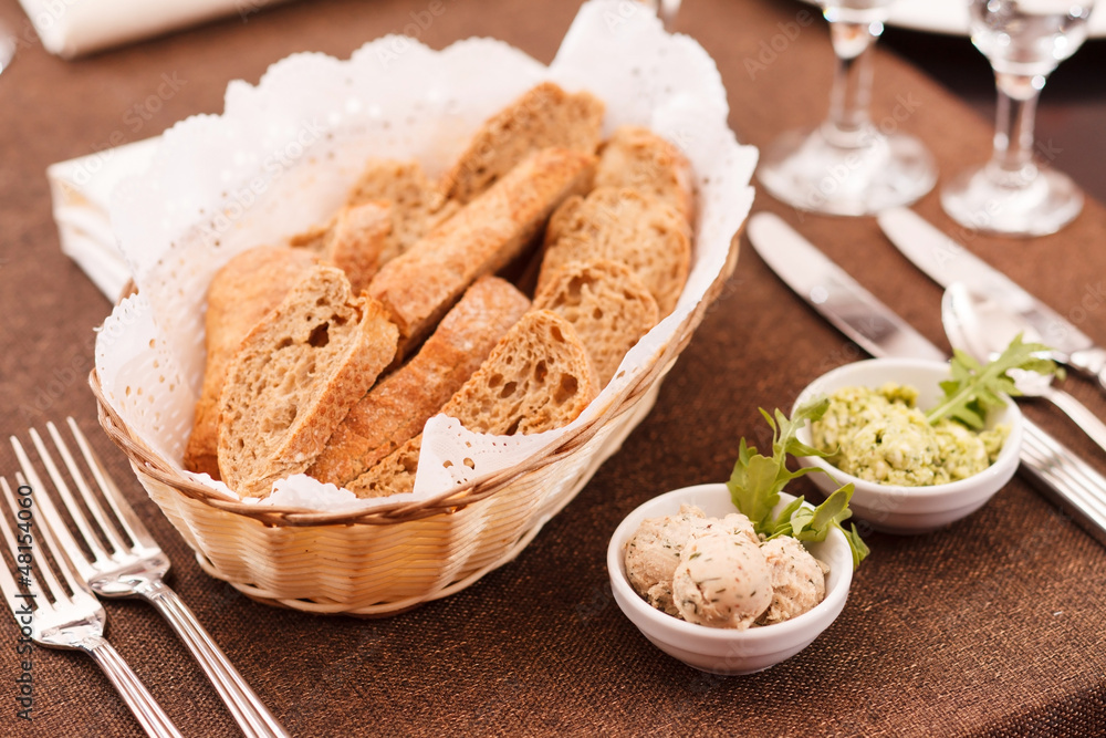 fresh crusty bread in a basket fresh crusty bread in a basket