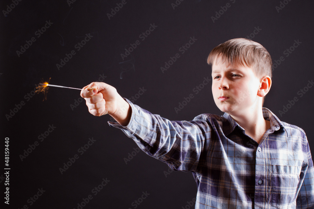 Obraz premium boy with sparklers