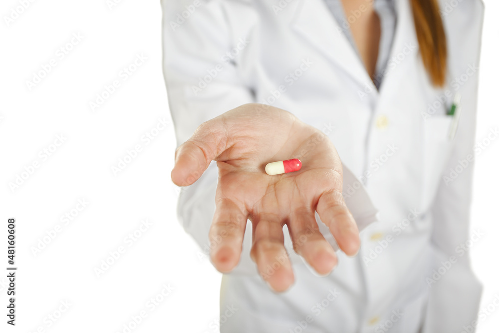 medical woman with pill in the hand medical woman with pill in the hand