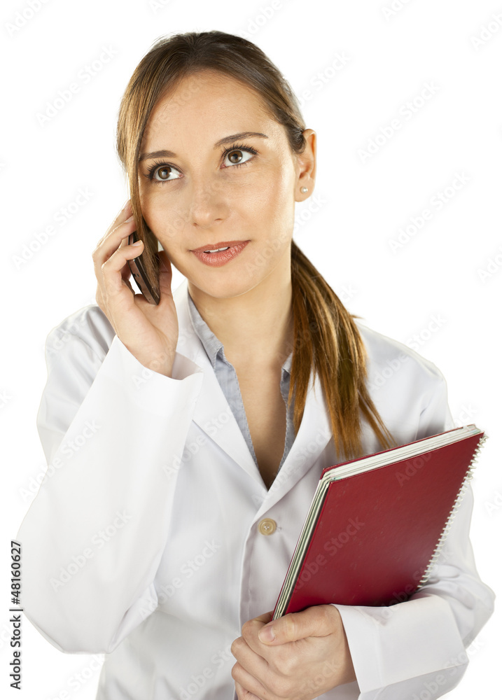 young medical woman calling by mobile phone young medical woman calling by mobile phone