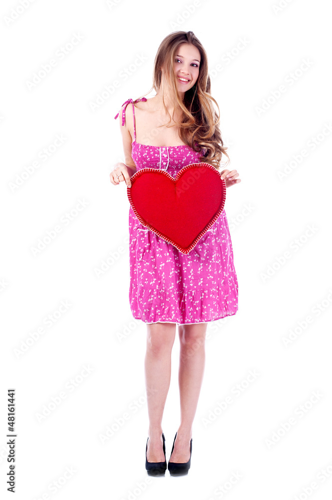 Valentine's Day. Beautiful smiling woman with heart in his hands Valentine's Day. Beautiful smiling woman with heart in his hands