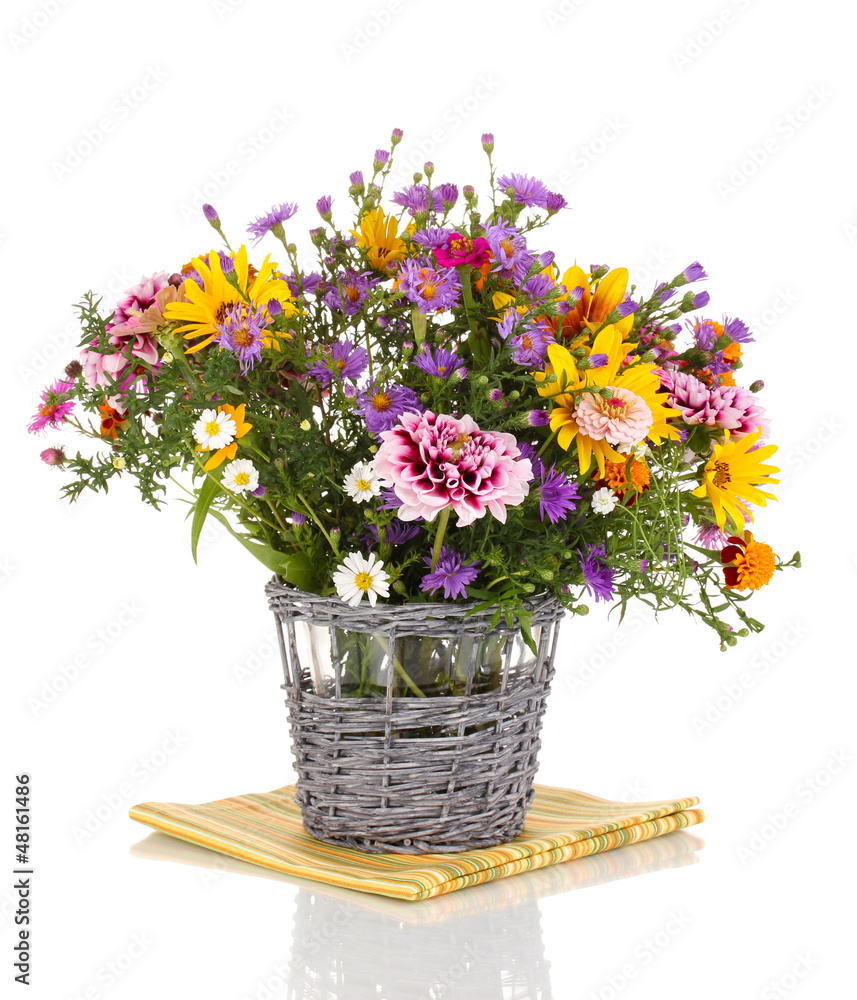beautiful bouquet of bright flowers in basket isolated on white