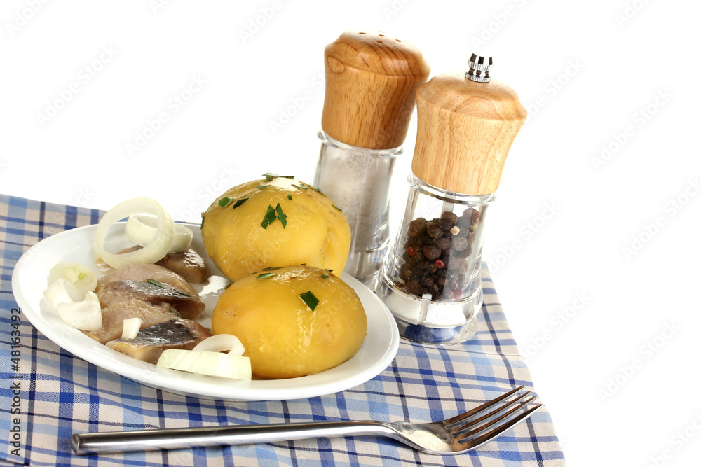Dish of herring and potatoes on plate isolated on white Dish of herring and potatoes on plate isolated on white