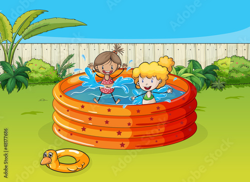 Girls playing in swimming pool