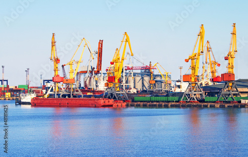 Cargo crane, ship and grain dryer in port Odessa, Ukraine