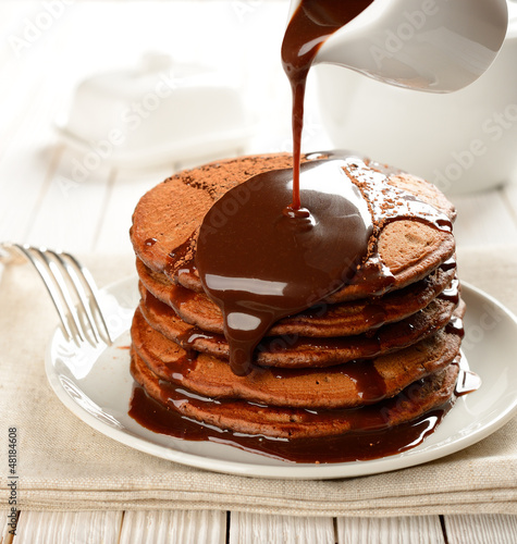 Chocolate pancakes with chocolate sauce