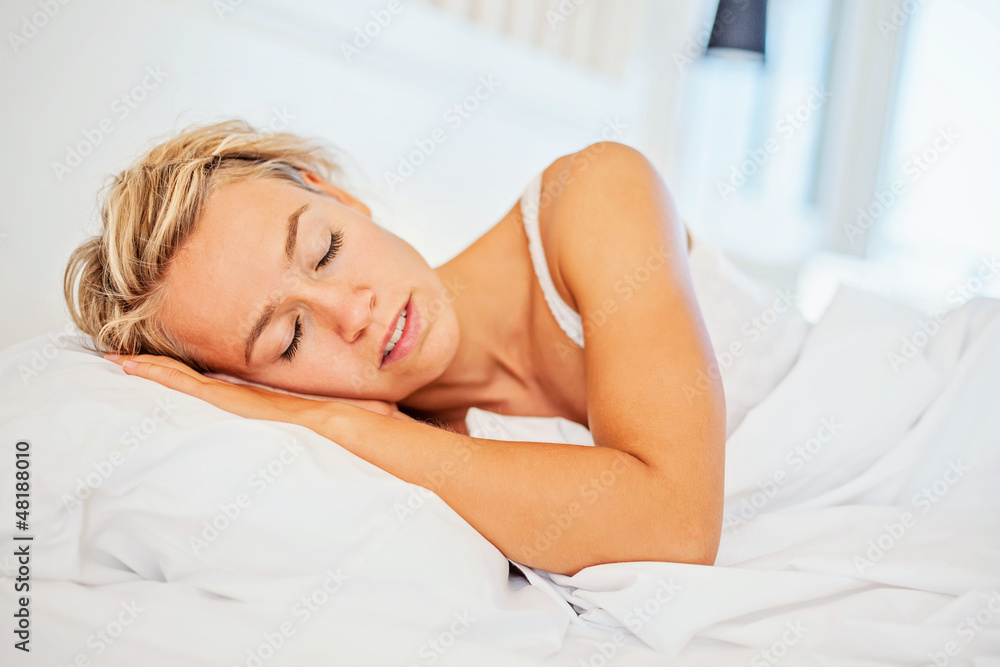Beautiful young woman sleeping in bed Beautiful young woman sleeping in bed