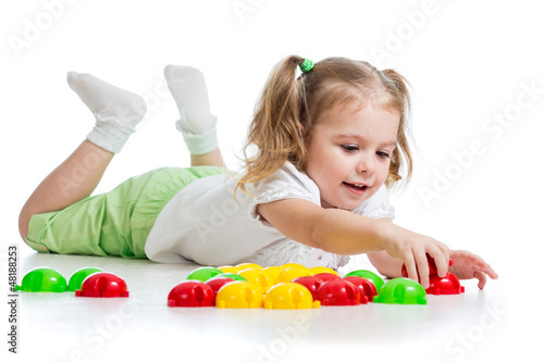 Cute child playing with  mo...