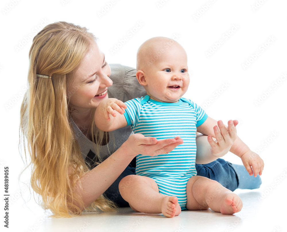 loving mother holding baby boy isolated on white loving mother holding baby boy isolated on white
