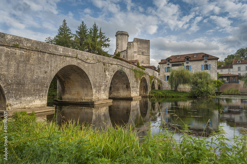 Medieval bridge and castle of Bourdeilles, Dordogne, France © Christian Delbert