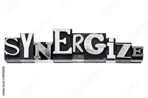 synergize word in metal type photo