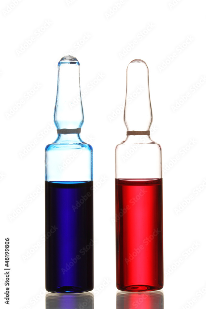 medical ampules with red and blue liquid, isolated on white medical ampules with red and blue liquid, isolated on white