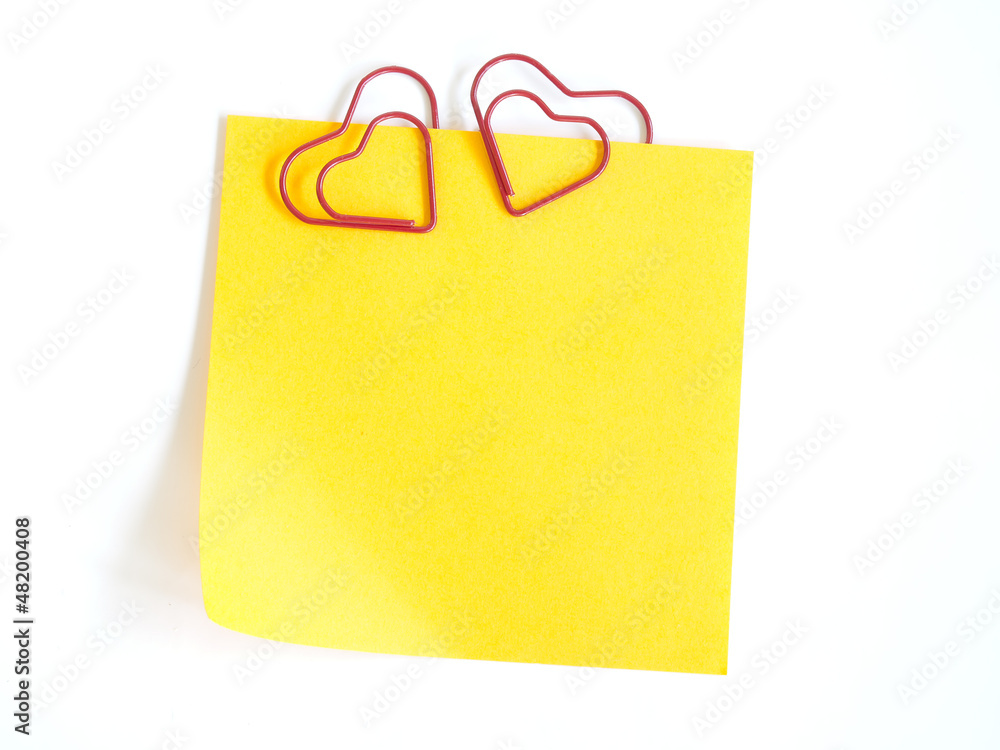 paper are fastened by a paper clip heart paper are fastened by a paper clip heart