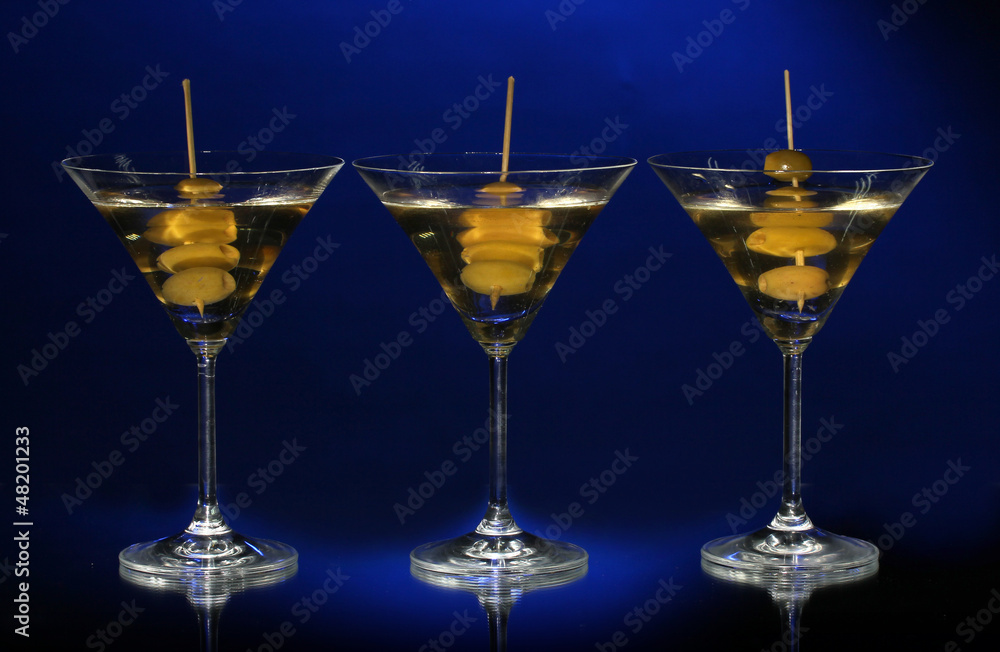 Martini glasses on dark background Martini glasses on dark background