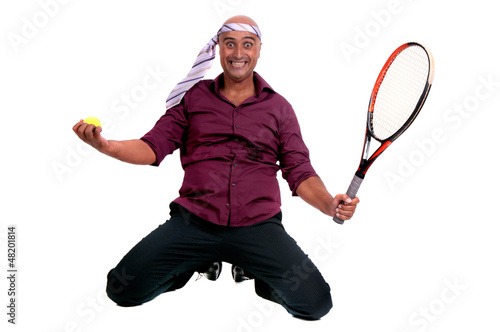 business man playing tennis © verkoka