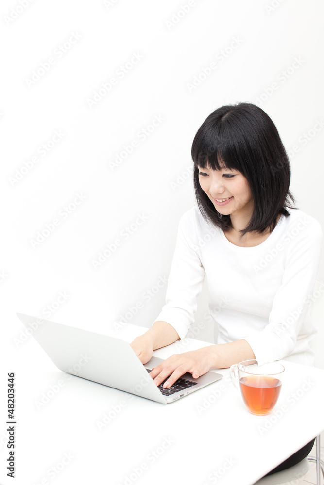 attractive asian woman using laptop attractive asian woman using laptop