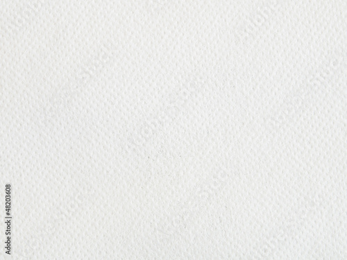 Perforated white paper texture