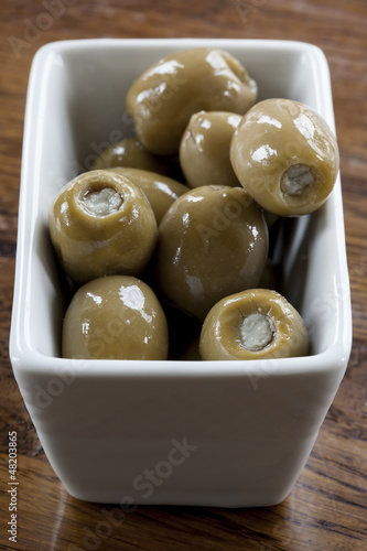 Green Olives in a White Bowl