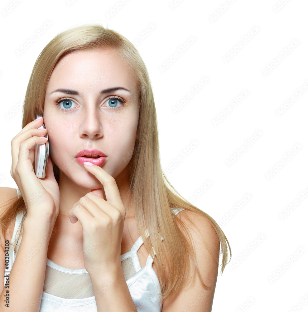 young woman shocked with cell phone