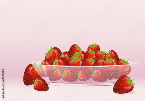 Tasty ripe strawberries on a transparent plate