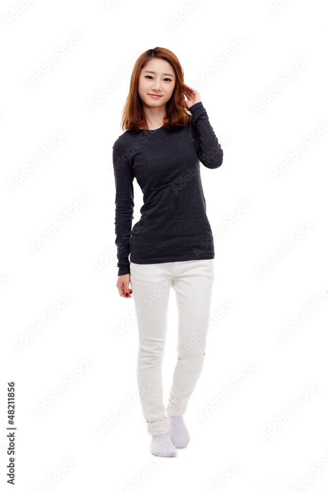 Young Asian woman full shot isolated on white background. Young Asian woman full shot isolated on white background.