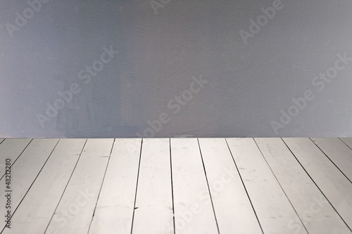 wooden floor and concrete wall