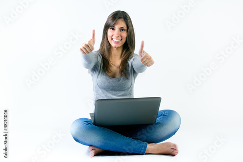 beautiful teenager  browsing internet at home © nenetus