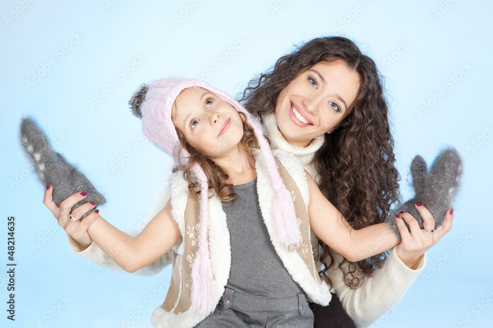 Happy family having fun at winter time Happy family having fun at winter time