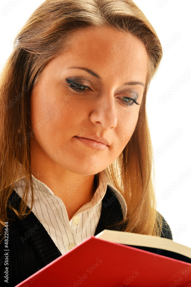 Young woman reading a book. Female student learning Young woman reading a book. Female student learning