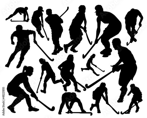 players in hockey on the grass vector
