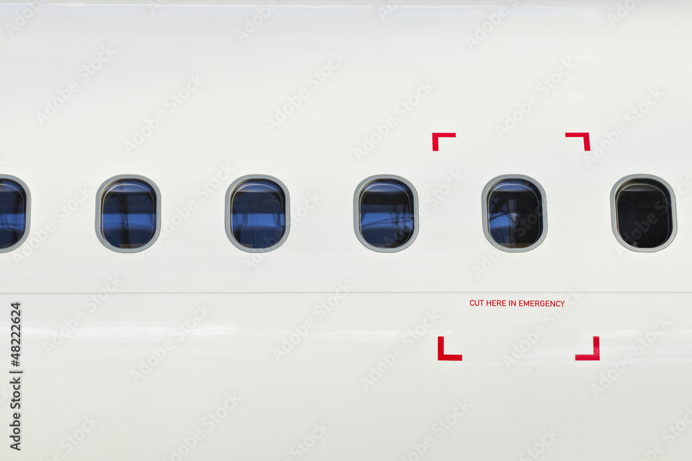 Naklejka premium Windows samolotu ze znakiem awaryjnym.