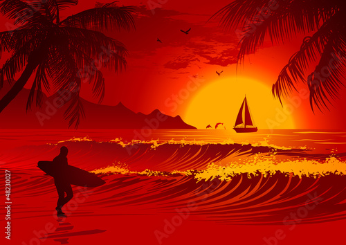 Silhouette of the man with a surfboard at sunset