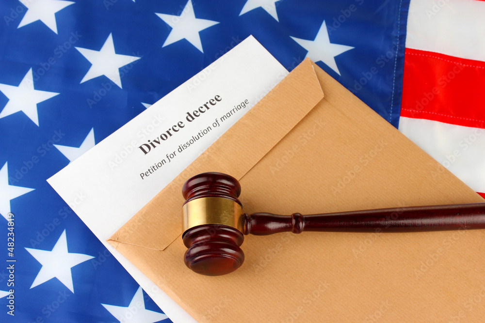 Divorce decree and envelope on american flag background