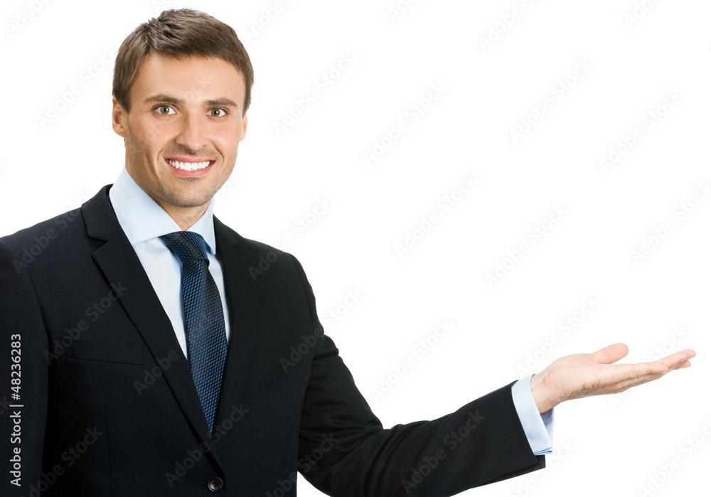 Businessman showing area for sign or copyspase Businessman showing area for sign or copyspase