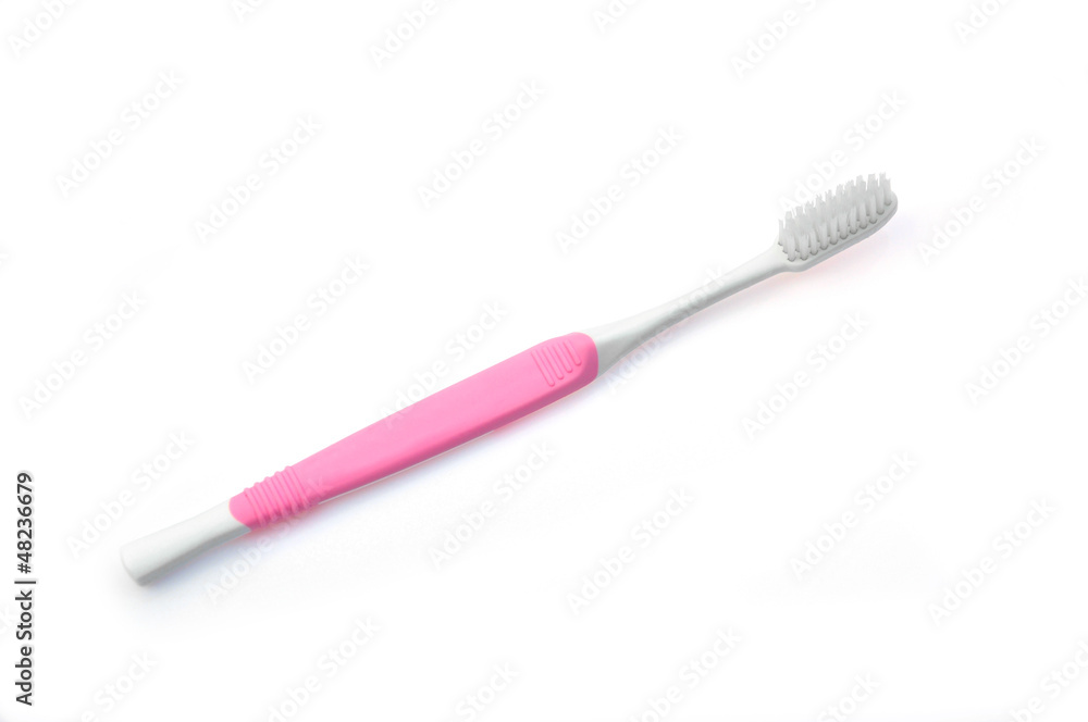 A toothbrush isolated on white, good hygiene A toothbrush isolated on white, good hygiene