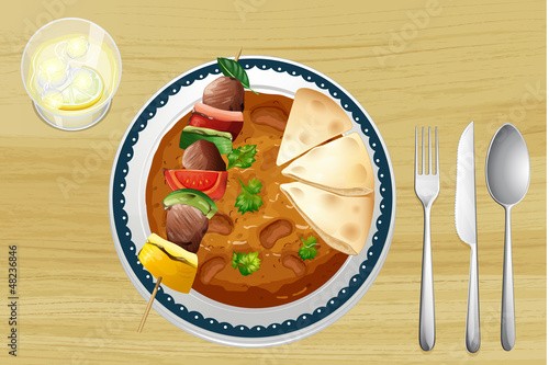 A meat, a bean curry and a bread