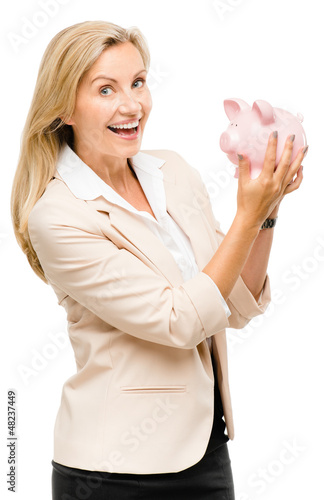 Happy Mature woman holding piggy bank isolated on white backgrou photo