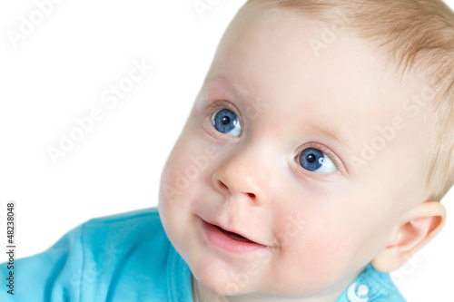 Portrait of 8-months old baby boy   on white background.