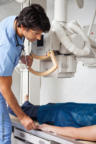 Technician Taking Patient's X-ray photo