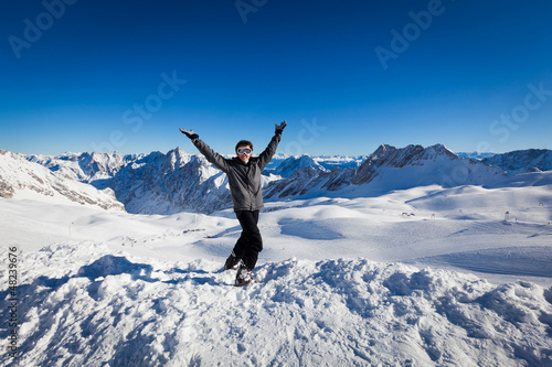 skier on top of the mountains © stakhov