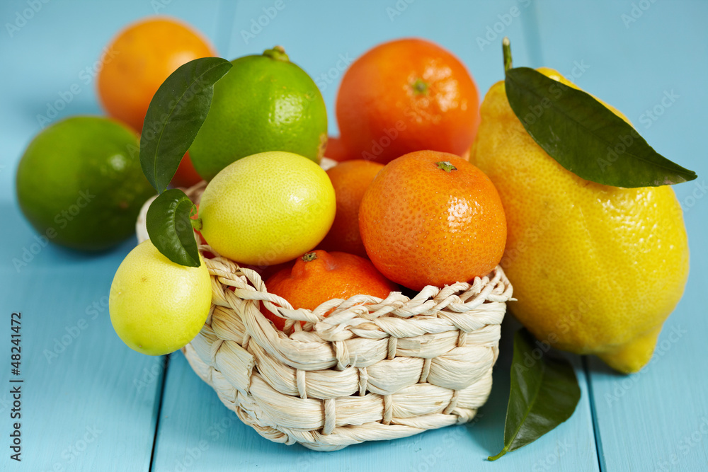 Fresh citrus fruit with leaves Fresh citrus fruit with leaves