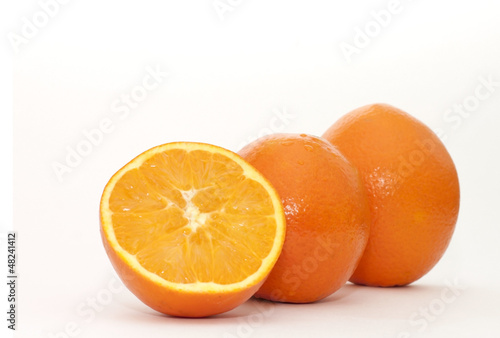 orange and slices isolated on white