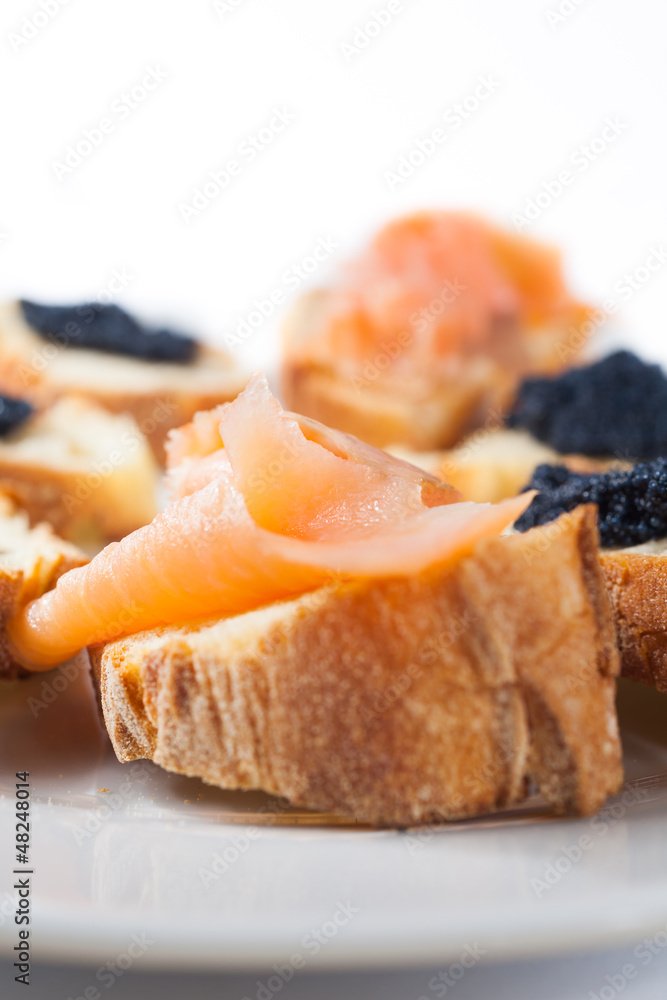 Crostini with salmon and caviar Crostini with salmon and caviar