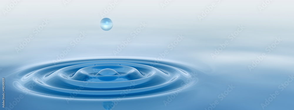 Conceptual blue water drop falling background Conceptual blue water drop falling background